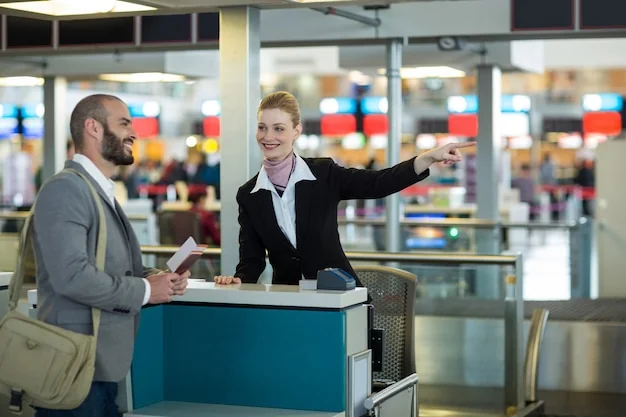 A traveller with an attendant at an airline check-in counter: group air is still arranged through airline group desks.
