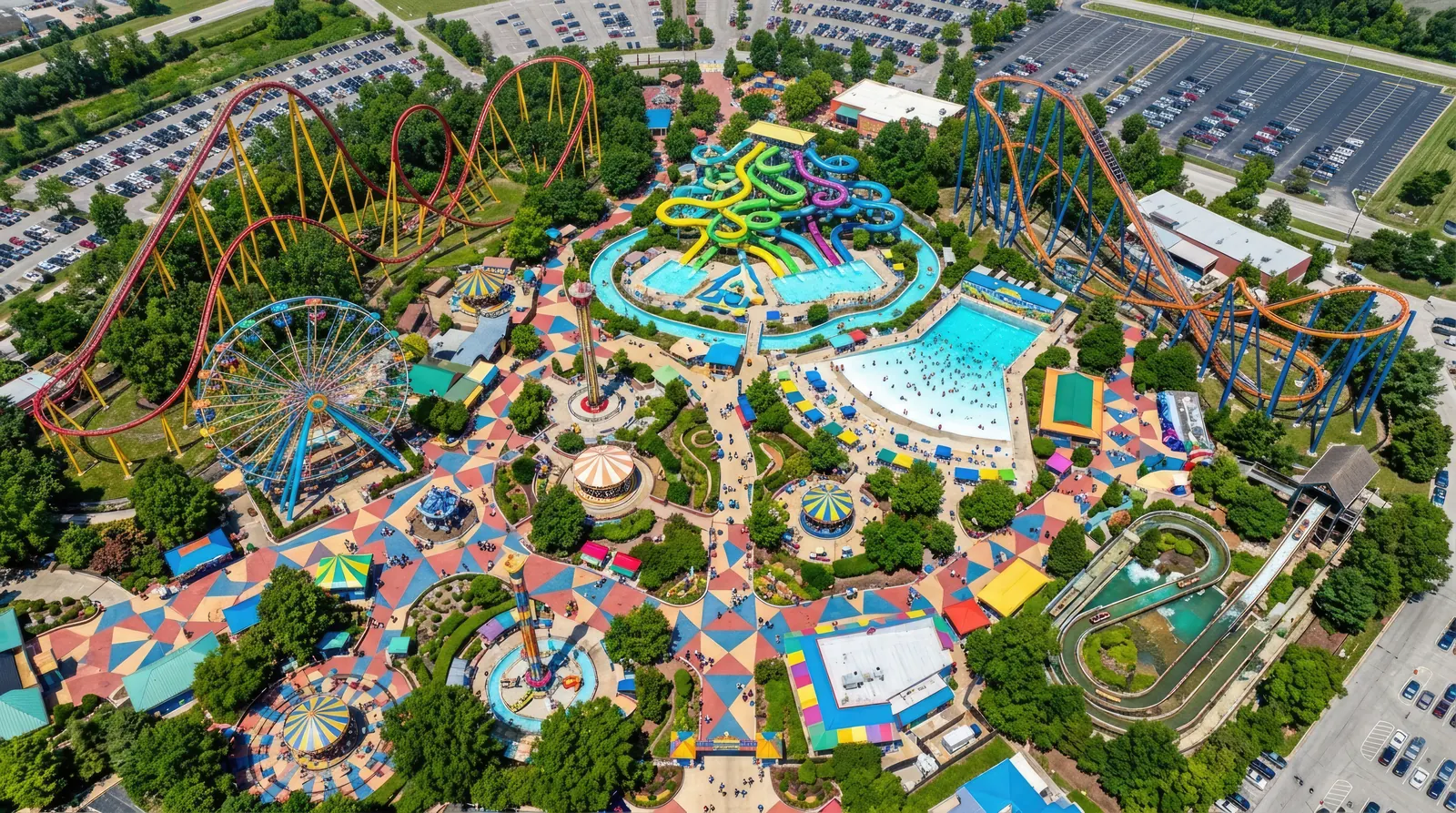 A large amusement park seen from the air, with roller coasters and pools.